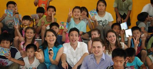 Family_volunteers_with_a_group_of_orphan_children_Taiwan.JPG