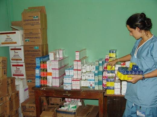 Elene helping to set up a free healthcare clinic in Nigeria